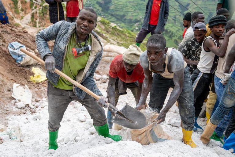 (250520) -- RUBAYA (DR CONGO), May 20, 2025 (Xinhua) -- Miners load excavated ore at a coltan mining site in the town of Rubaya, the Democratic Republic of the Congo (DRC), on May 7, 2025. In the mist-veiled highlands of Masisi territory, a silent war for control over one of the world's most strategic minerals is raging. Rubaya, a remote town in the eastern Democratic Republic of the Congo (DRC), has once again found itself at the heart of a global supply chain entangled in armed conflict and rebel rule. Since April 2024, the March 23 Movement (M23) rebel group has maintained control over Rubaya's lucrative coltan mining sites. The ore -- columbite-tantalite, commonly known as coltan -- yields tantalum, a rare metal essential for manufacturing smartphones, fighter jets, medical implants, and advanced electronics. According to United Nations estimates, Rubaya alone accounts for more than 15 percent of the world's tantalum supply. (Xinhua/Zheng Yangzi) TO GO WITH Feature: Mist and metal -- coltan grab in eastern DR Congo